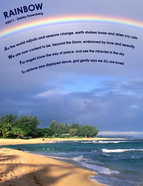 Rainbow stretching over a beach