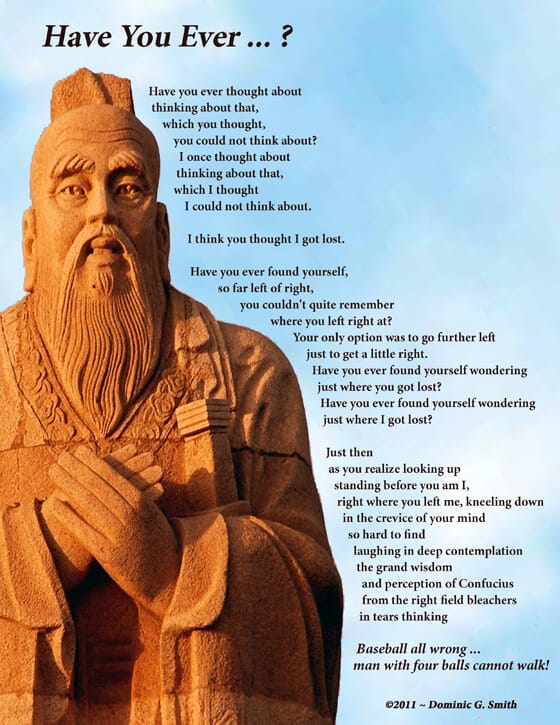 statue of Confucius with blue sky
