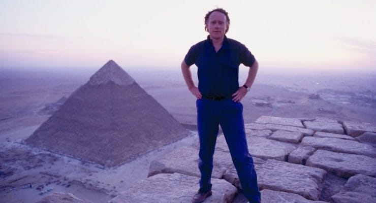 Graham Hancock on top of the Great Pyramid of Giza Photo by SANTHA FAIIA_Graham-Hancock_OMTimes