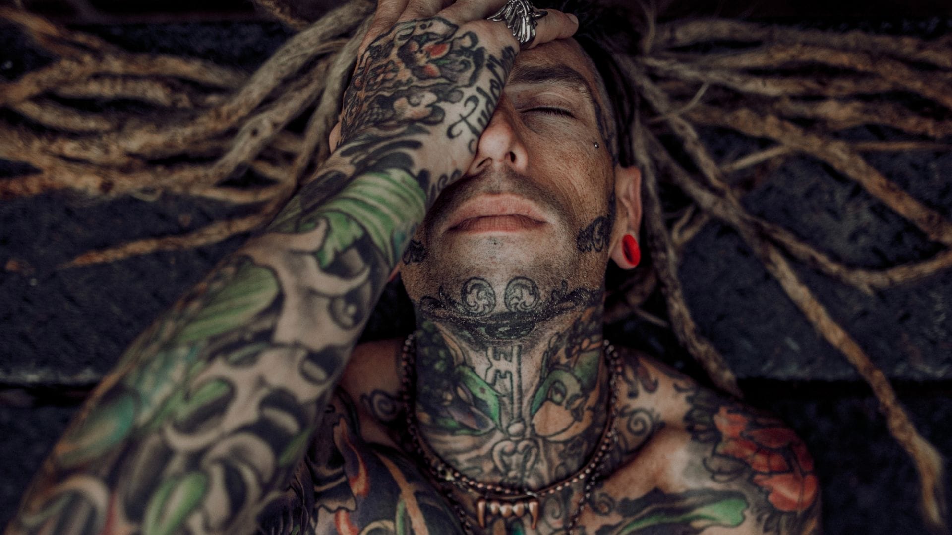 Delve into the energetic and disruptive influence that tattoos have on individuals and society